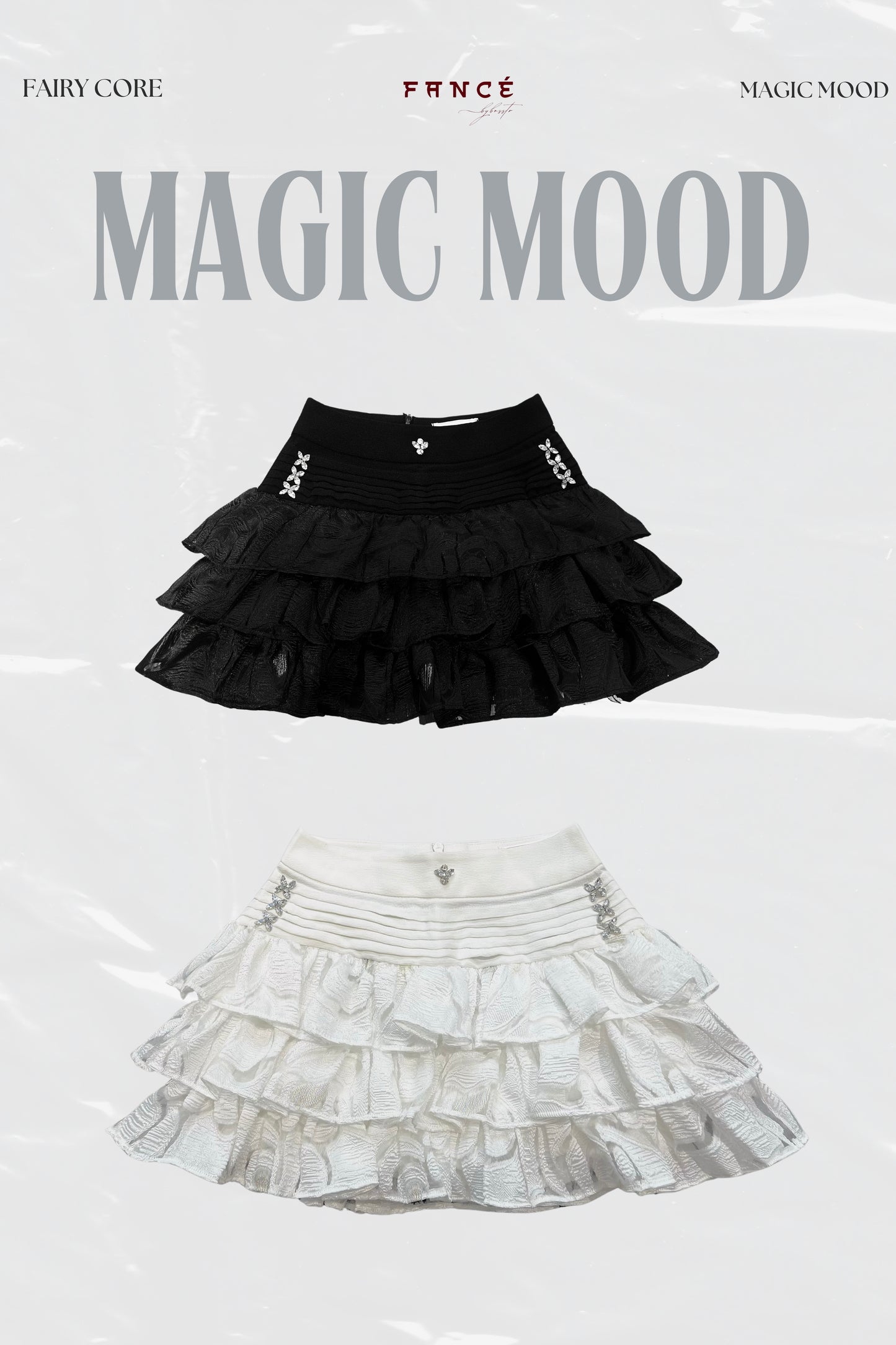 Black and white tiered skirts with 'Fairy Core' branding on a light gray background.