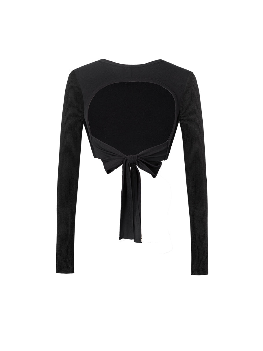 Black long-sleeve top with a tie detail on a white background