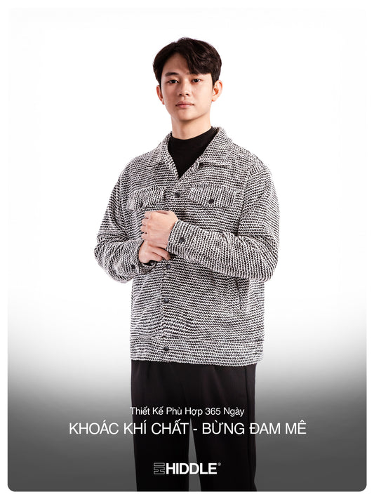 Man wearing a patterned shirt with text overlay on a white background