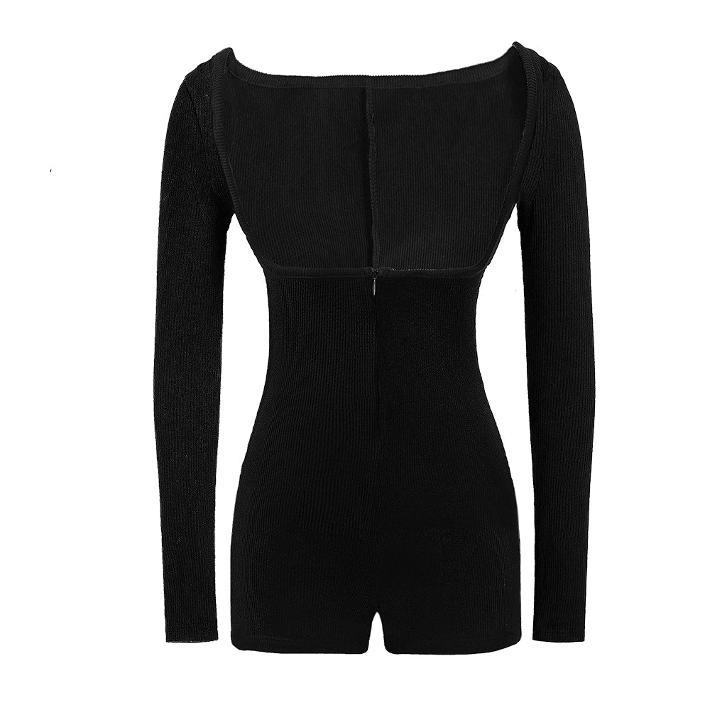 Black ribbed long-sleeve romper on a white background