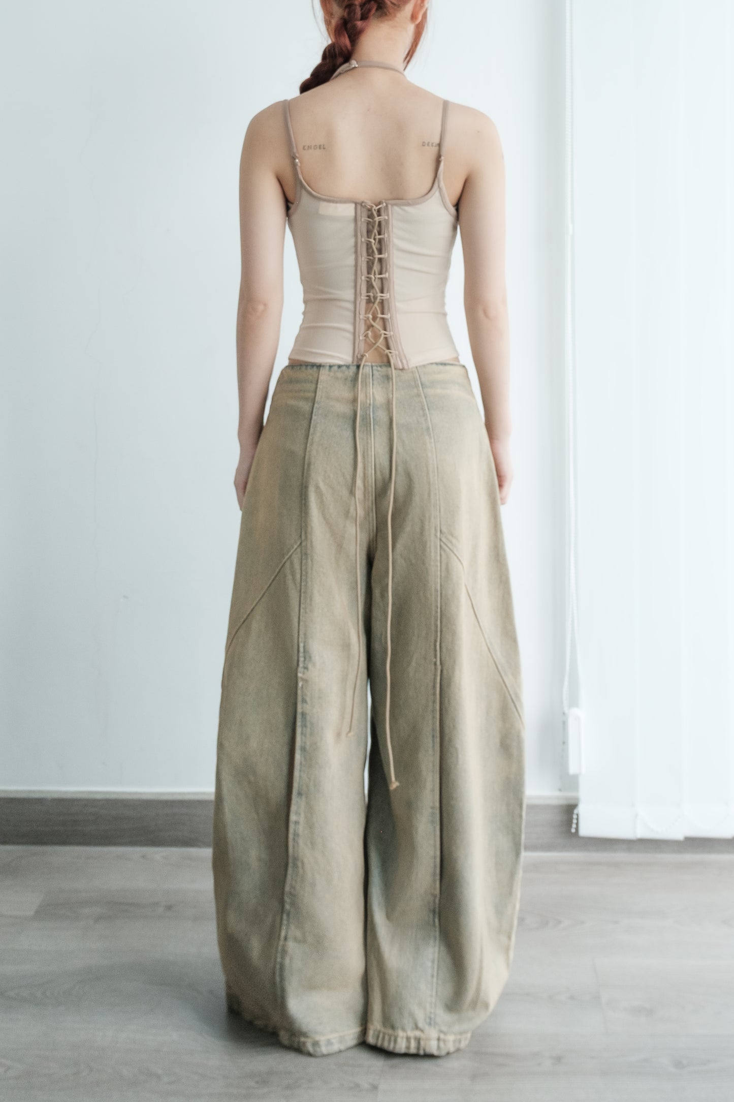 Bunnyhill Melios Top – side angle with subtle high neckline