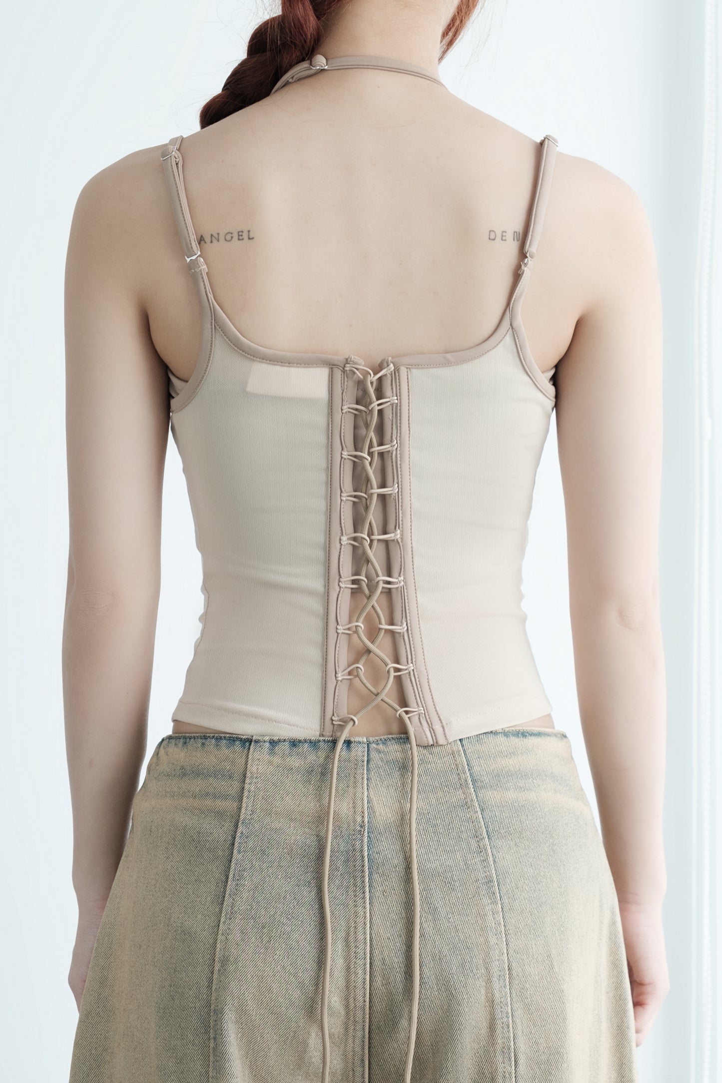 Close-up of mesh fabric and sleeve detail