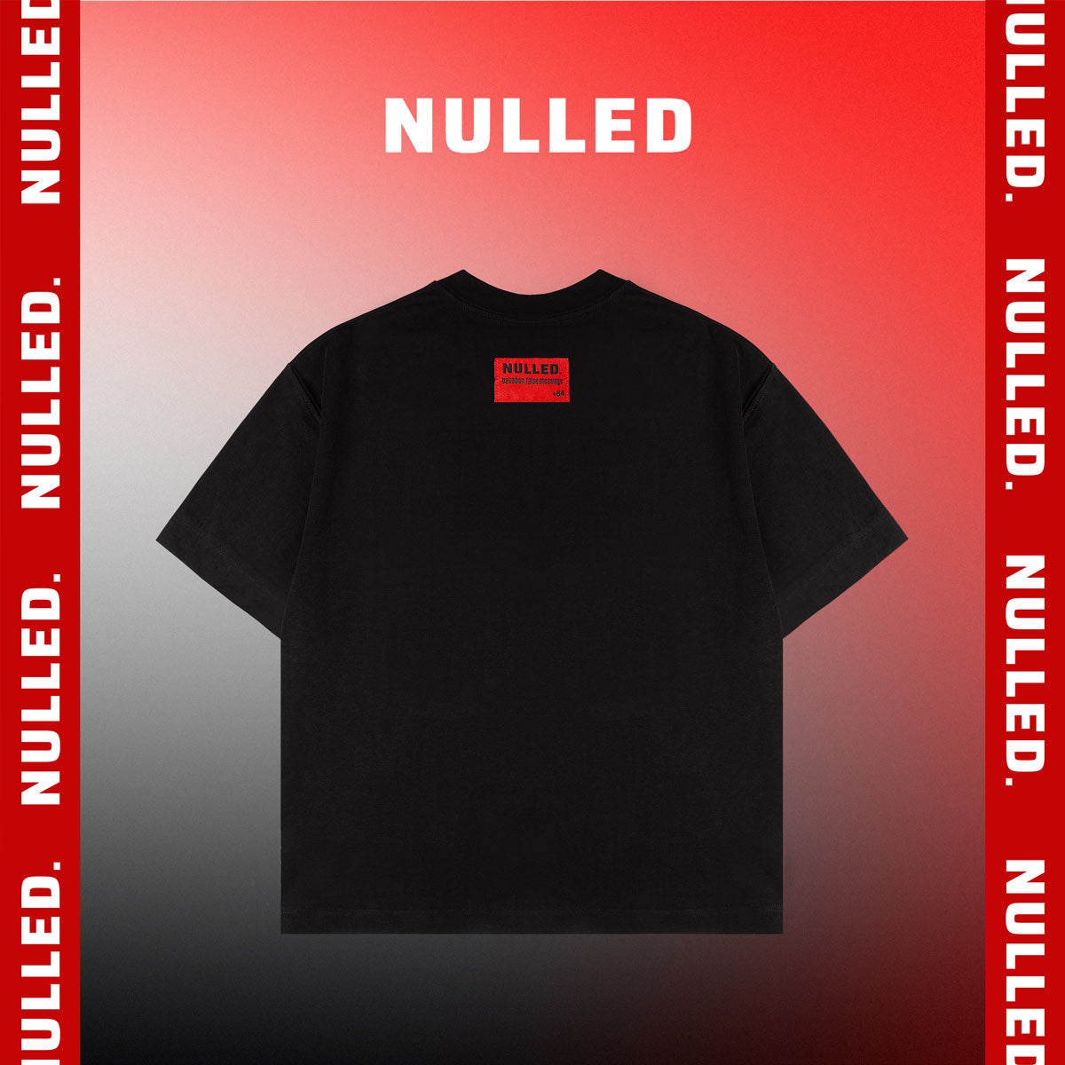 Black t-shirt with 'NULLED' logo on a red and gray gradient background