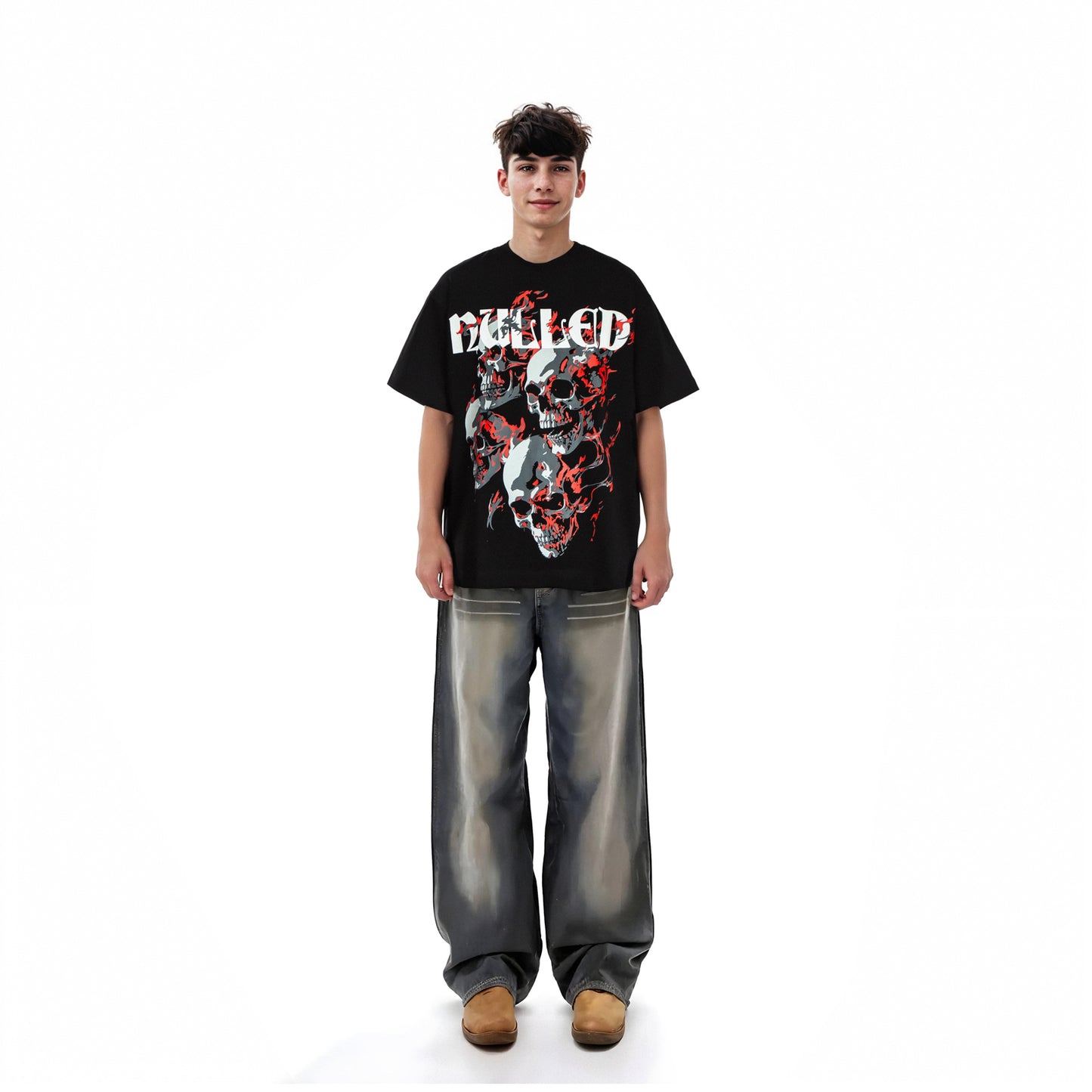 Person wearing a black graphic t-shirt with a design on a white background