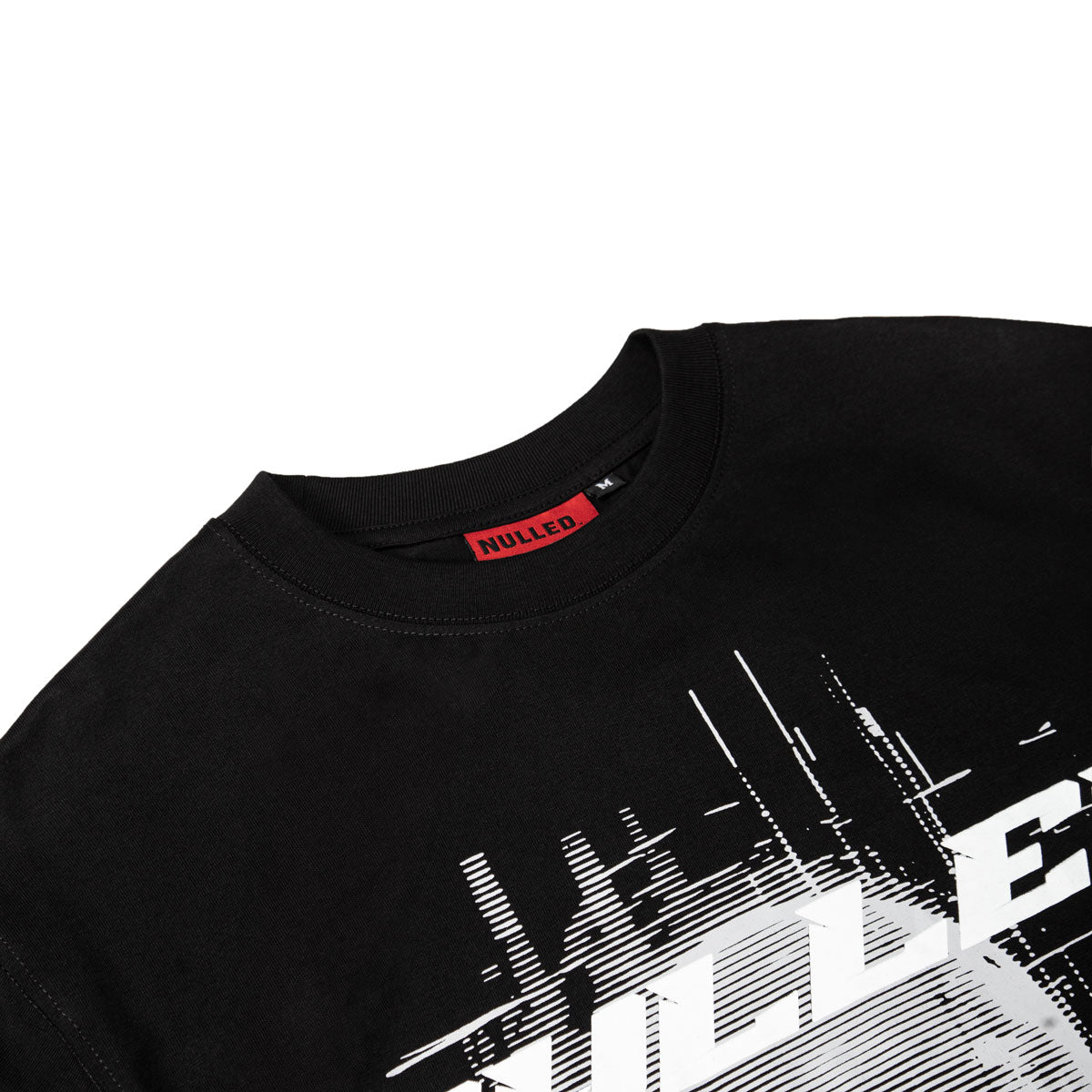 Black t-shirt with white graphic design and red label on a white background