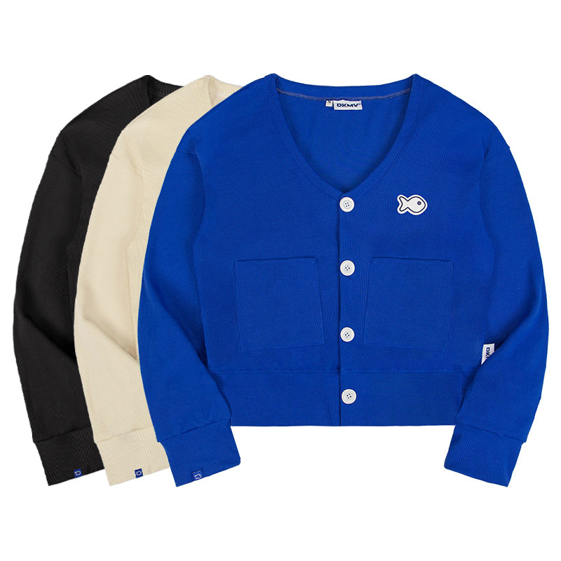 Blue cardigan with a fish emblem on a white background