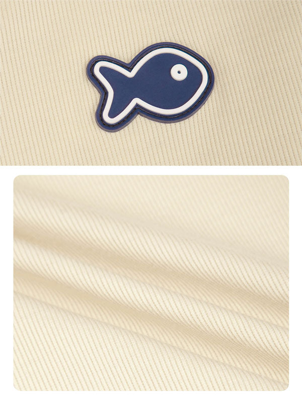 Beige fabric with a blue fish logo on top