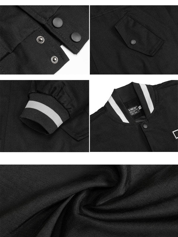 Black jacket with button details, pocket, sleeve, collar, and fabric texture shown in close-up.