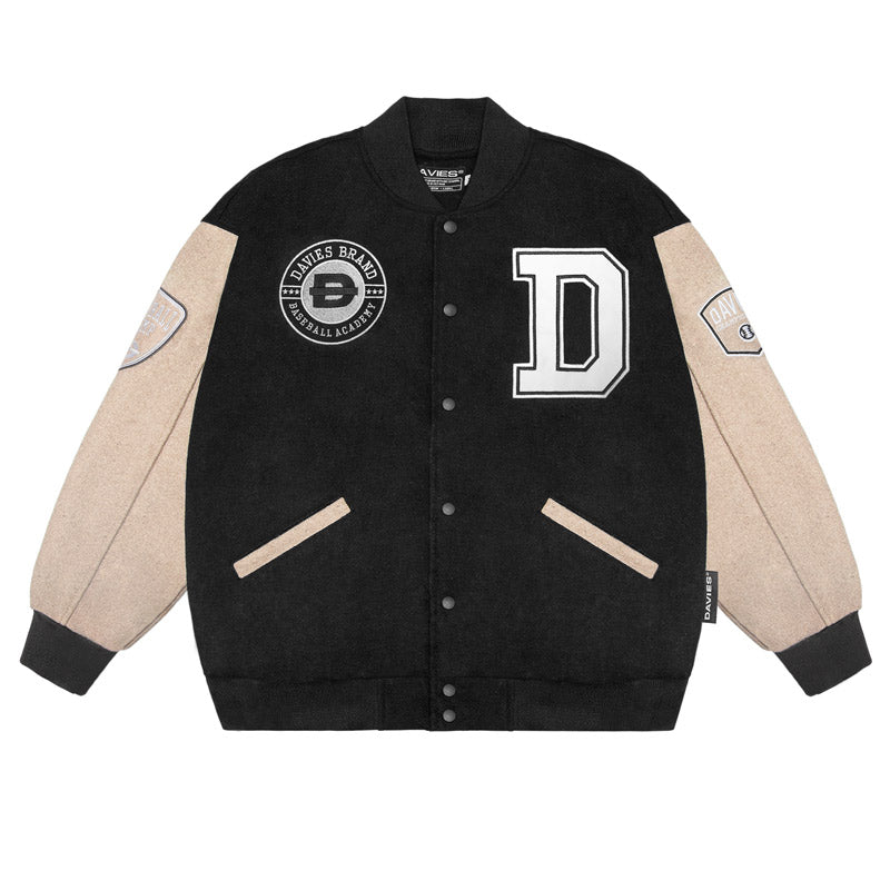 Black and beige varsity jacket with 'D' logo on a white background