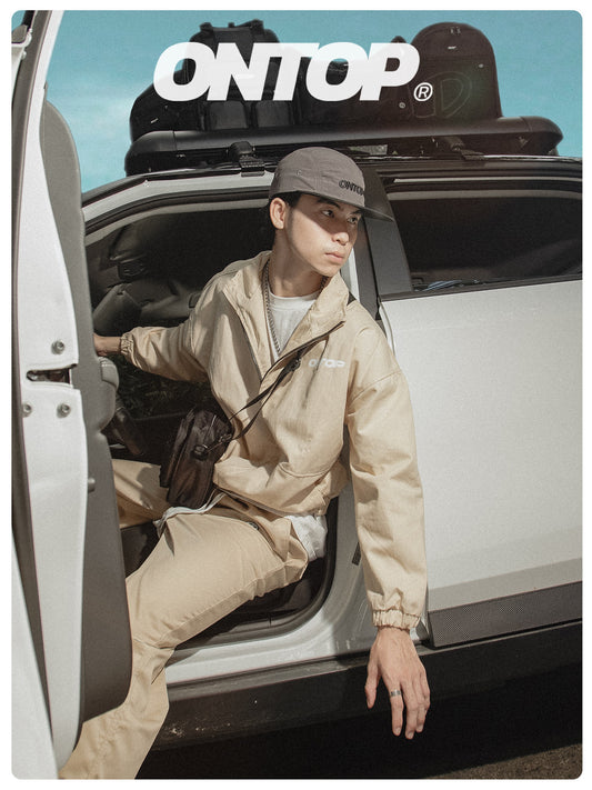 Person sitting in a car with 'ONTOP' roof rack system