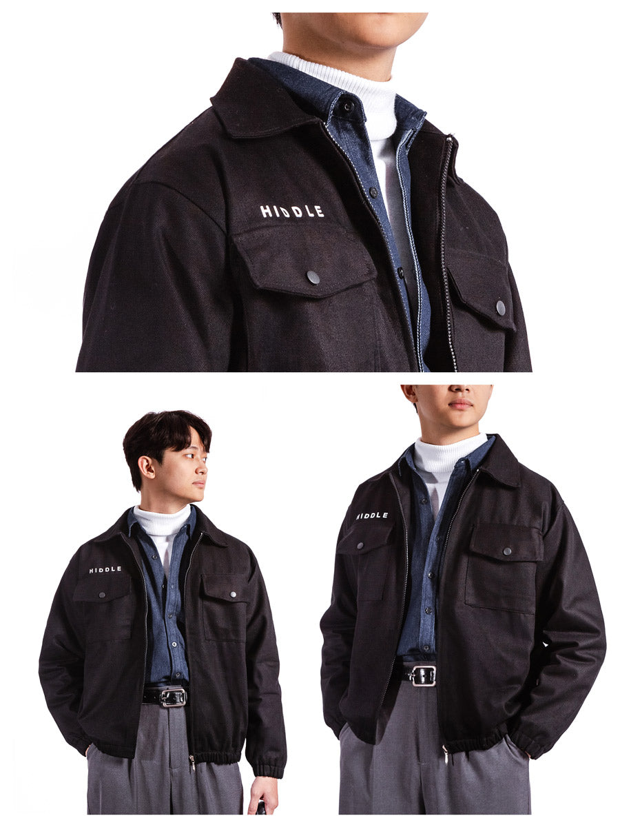 Black jacket with 'HIDDE' branding worn by a person on a white background