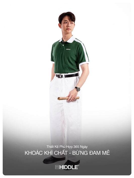 Person wearing a green and white sports outfit with a bat, standing against a white background.