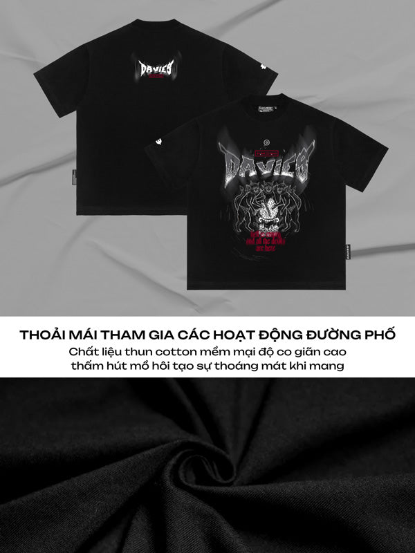 Black t-shirt with graphic design and brand logo on a gray background