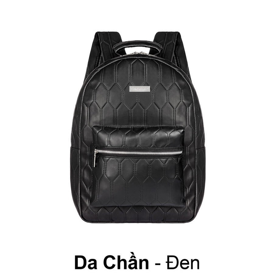Black quilted backpack on a white background