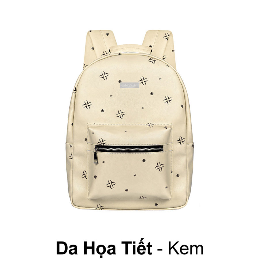 Beige backpack with star pattern on a white background