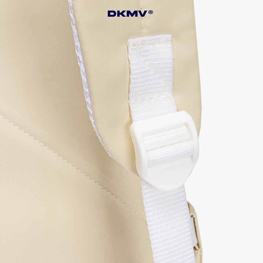 White arm brace on a beige background with DKMV branding.
