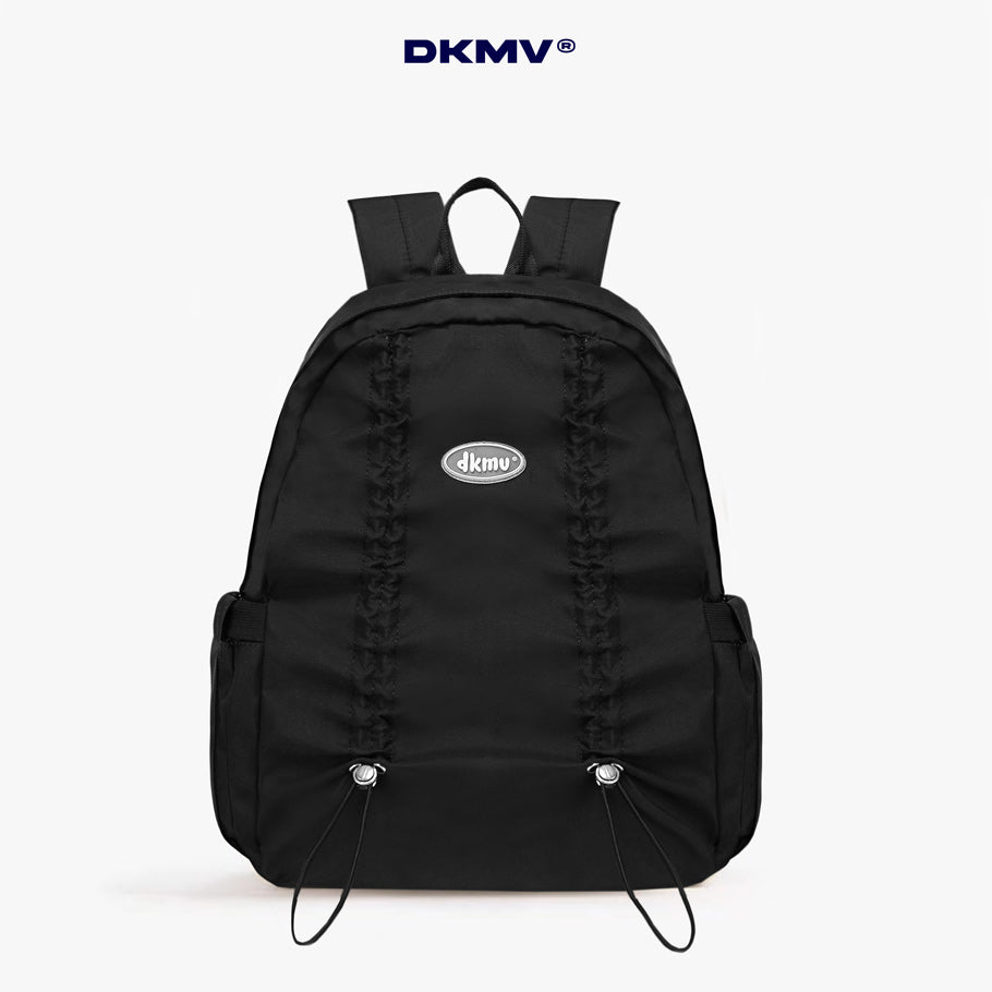 Black backpack with visible brand logo on a white background