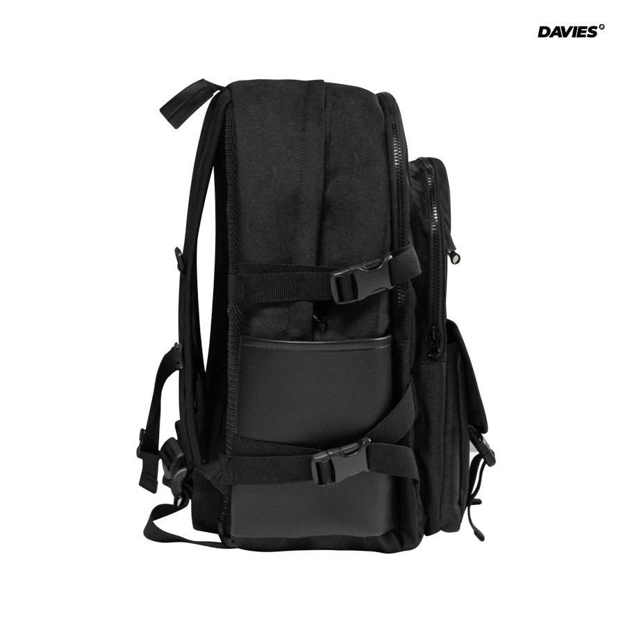 Black backpack with multiple pockets and straps on a white background, featuring the Davies brand.