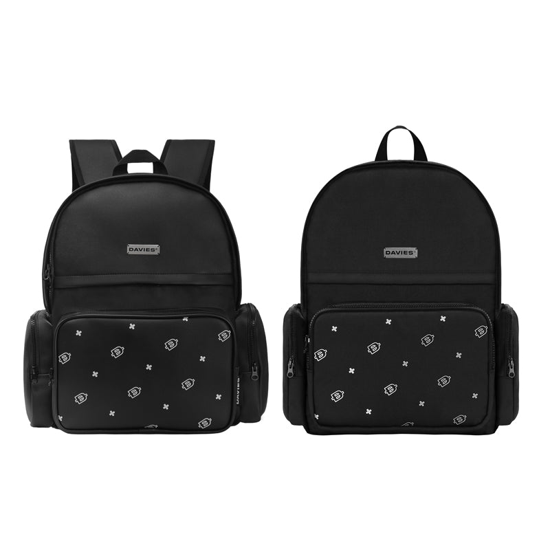 Two black backpacks with decorative patterns on a white background
