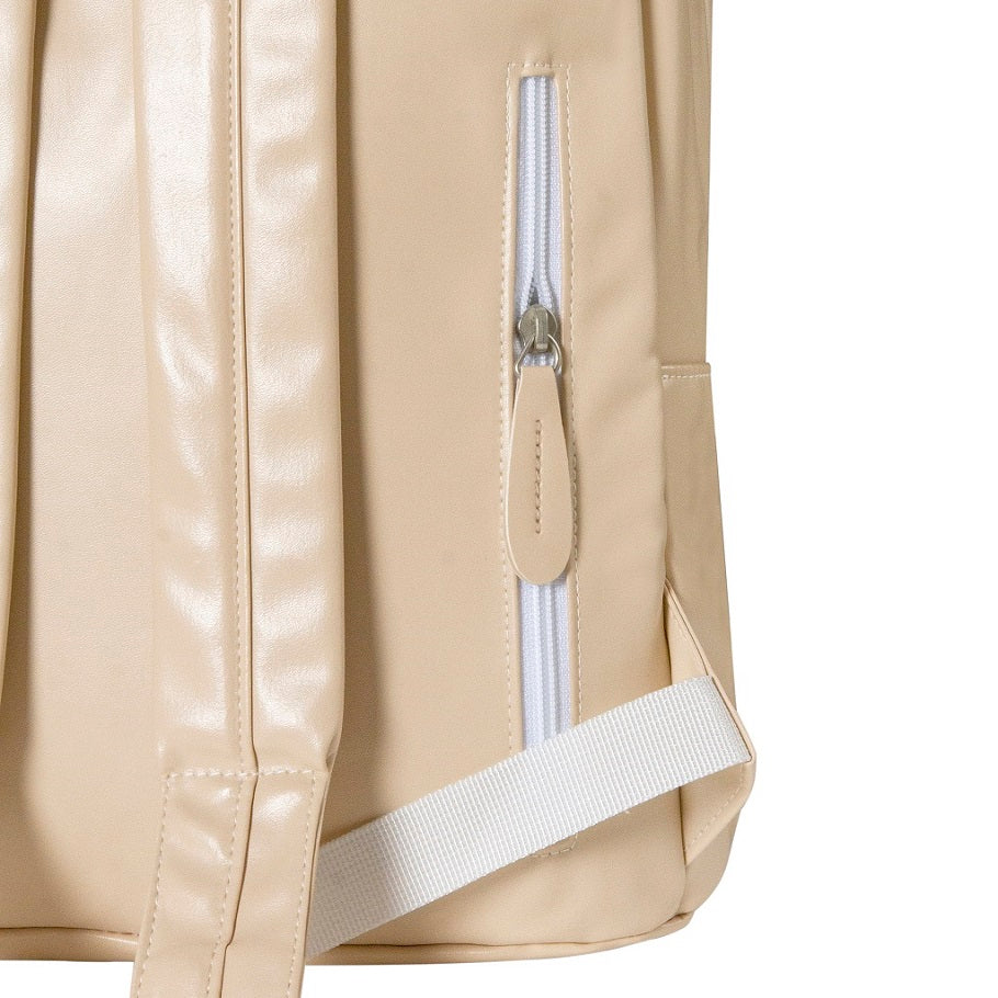 Close-up of a beige backpack with a zipper and strap on a white background