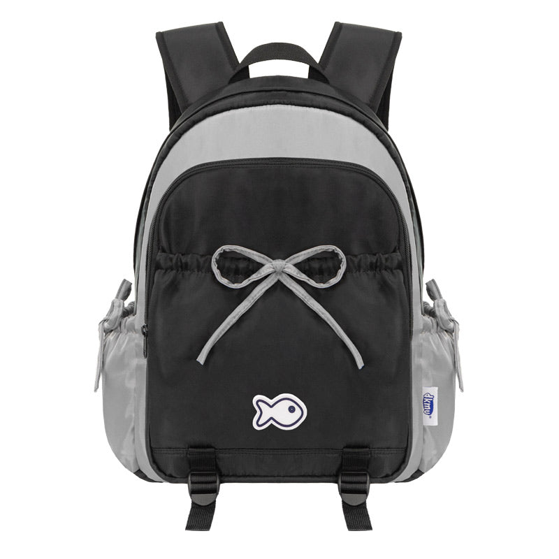 Gray and black backpack with a bow design on a white background