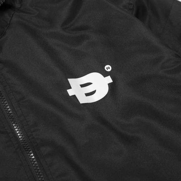 Black jacket with a white logo on the chest