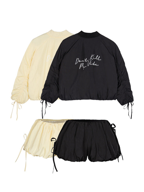 Black and beige outfit with text on a white background