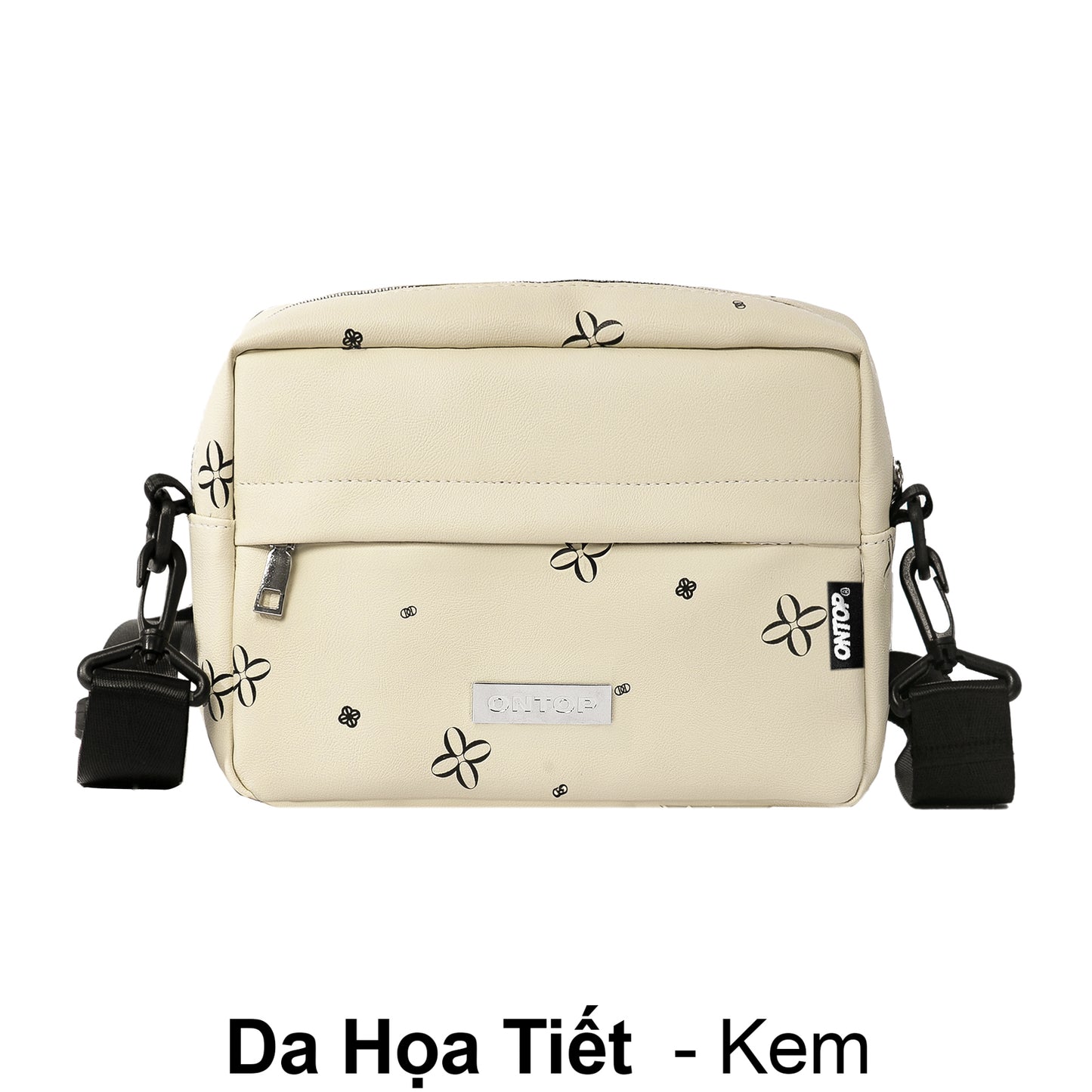Beige handbag with black floral patterns on a white background