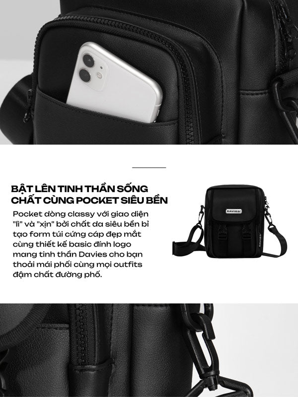 Black backpack with a pocket holding a phone, featuring the Davies brand.