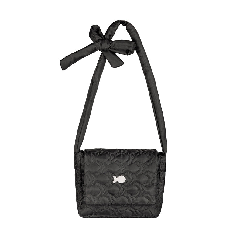 Black quilted handbag with a bow on a white background