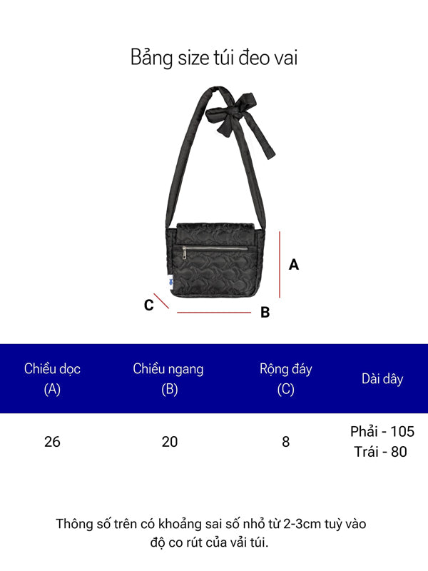 Black crossbody bag with measurements on a white background