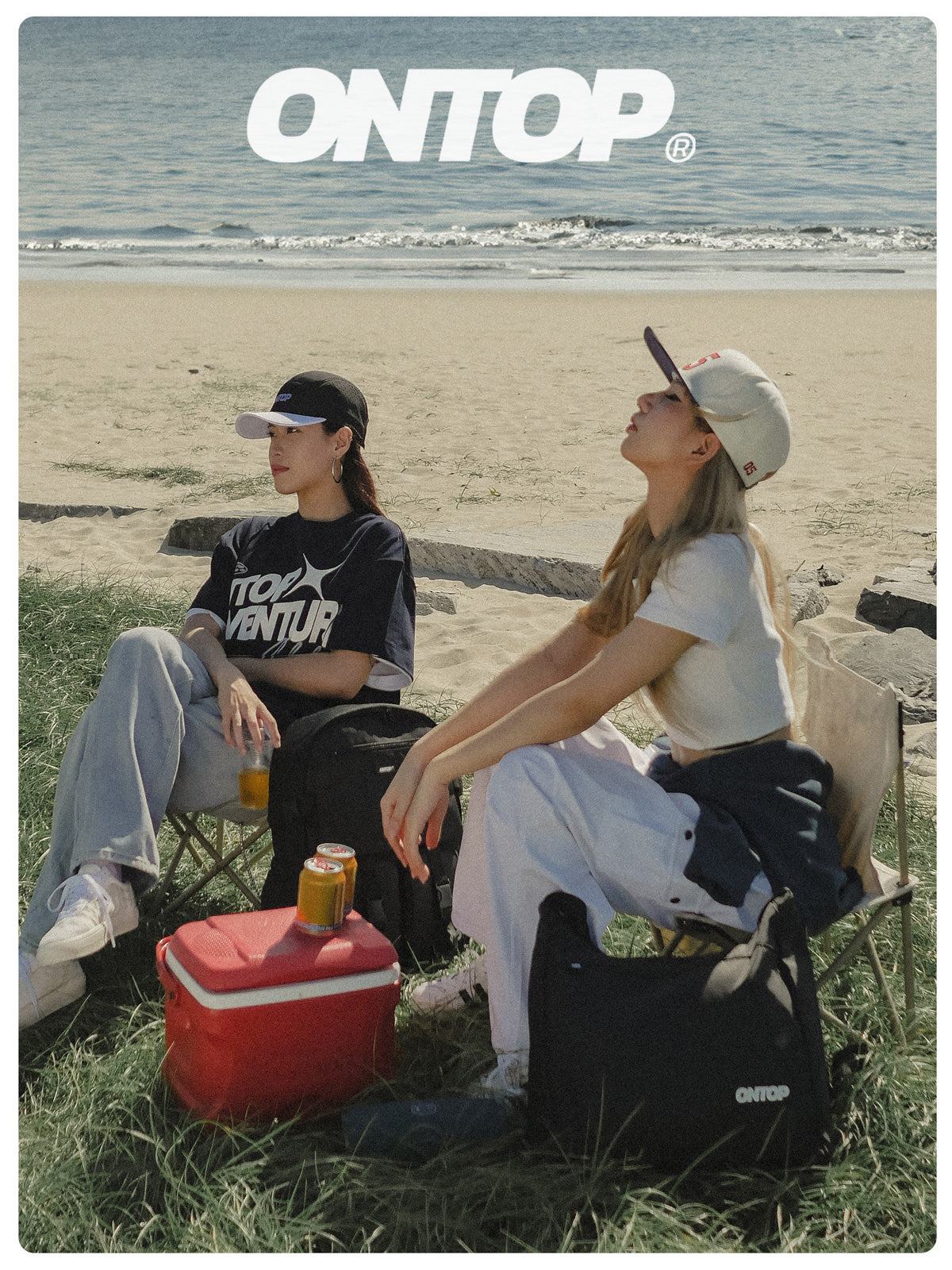 Two people sitting on chairs by the beach with a cooler and drinks, featuring the 'ONTOP' brand.