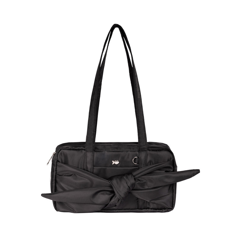 Black handbag with a large bow on a white background