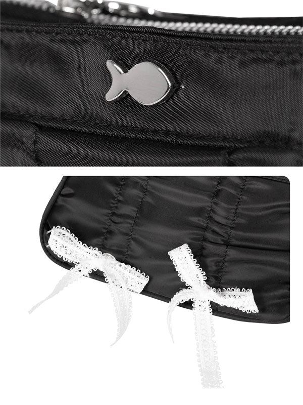 Black bag with silver fish-shaped clasp and lace trim on a white background