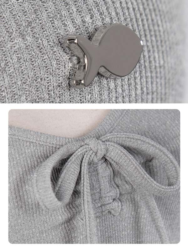 Gray textured fabric with a metal clip and close-up of a gray knitted garment with a bow.