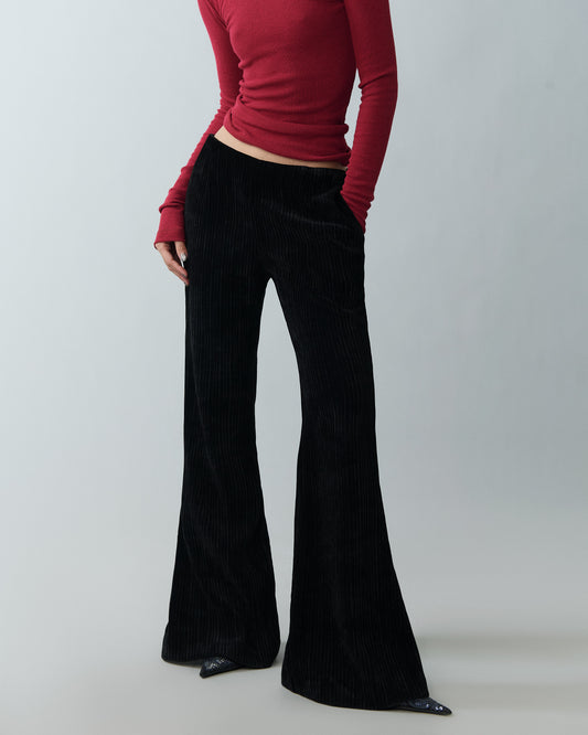 Full-length flared velvet pants with leg slit