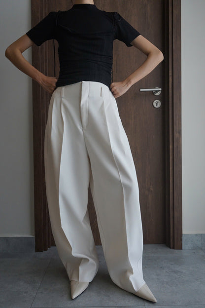 High-waisted curved leg pants