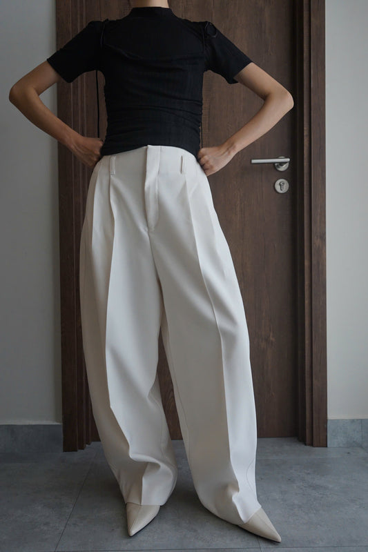 High-waisted curved leg pants