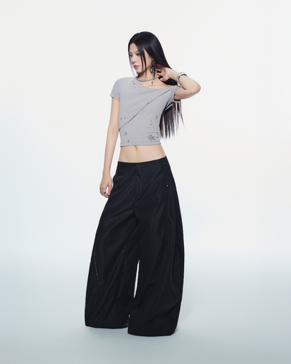 Side view of structured black pants – full-length silhouette