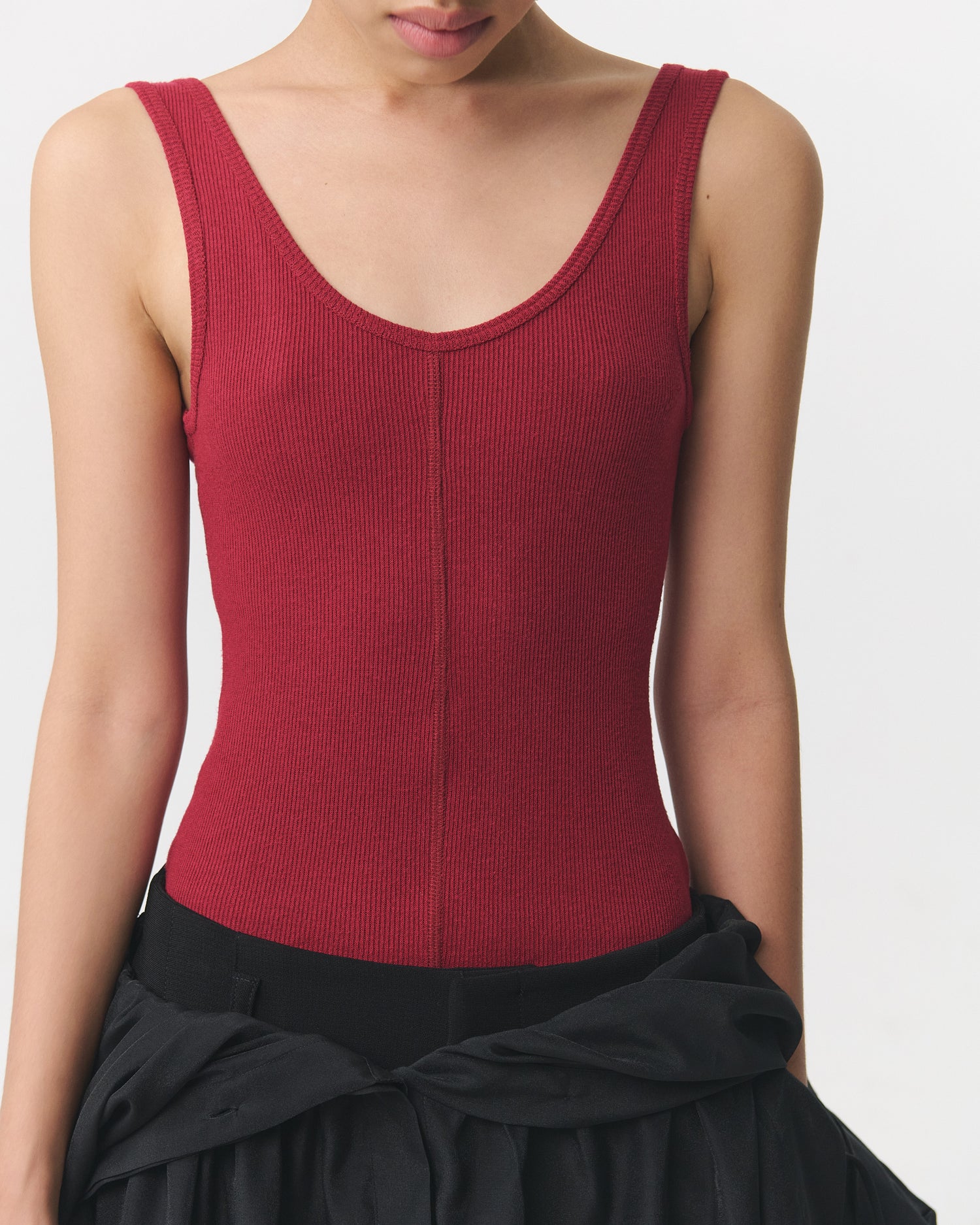 Model wearing fitted ribbed tank top