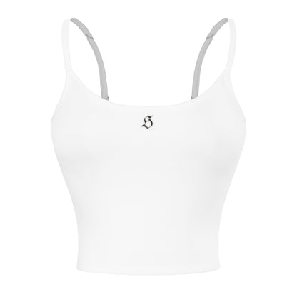 White sports bra with thin straps on a white background