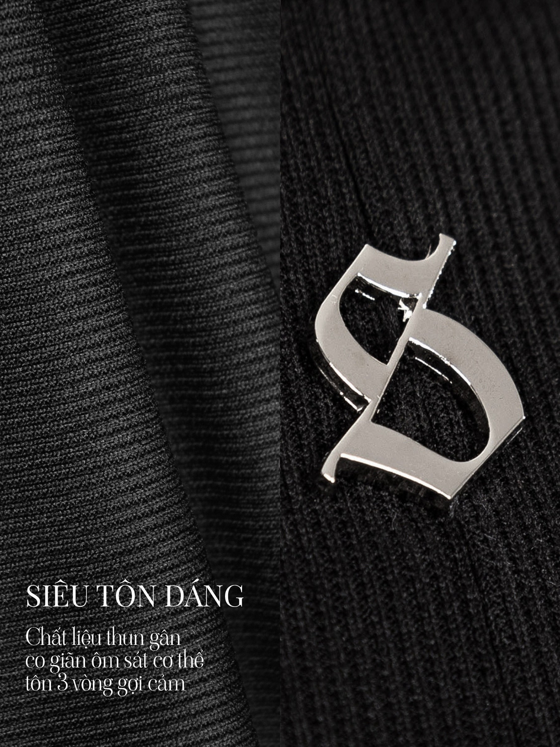 Close-up of a silver brooch on a textured black fabric background