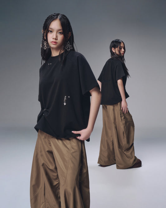 Button-down minimalist shirt with charm detail