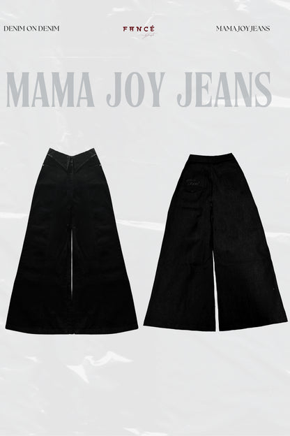 Black wide-leg jeans with 'Mama Joy Jeans' branding on a light gray background.