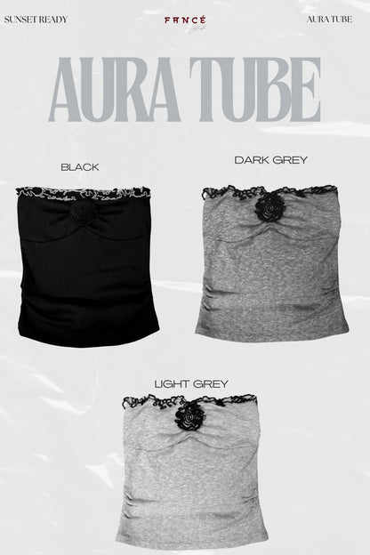 Three tube tops in black, dark grey, and light grey with lace details on a white background.
