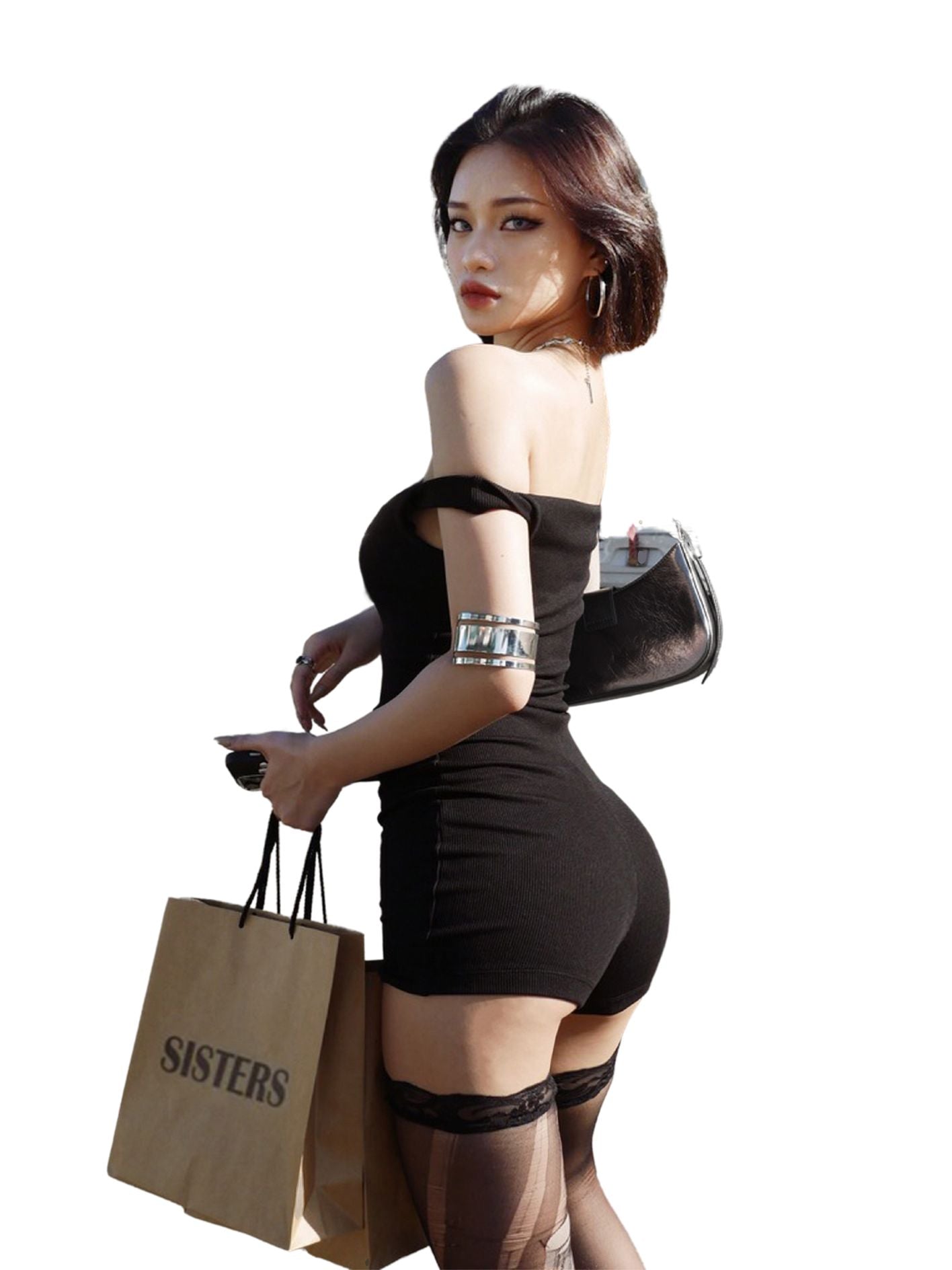 Woman in a black dress holding a 'SISTERS' bag on a white background