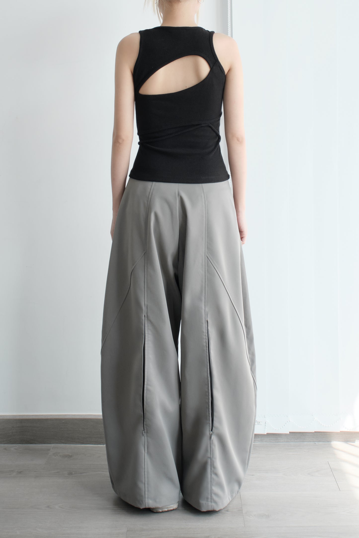 Side view of minimalist black tank – Bunnyhill outfit