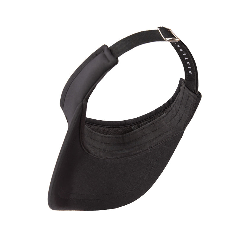 Black visor cap with a strap on a white background