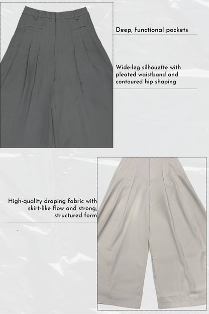 Gray wide-leg pants with pleated waistband and contoured hip shaping, featuring text descriptions.