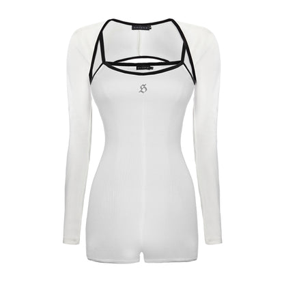 White long-sleeve top with black straps on a white background